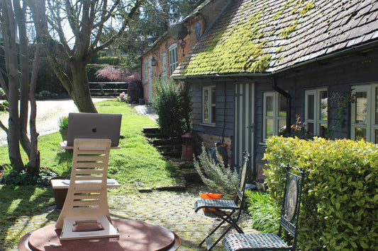 How to reduce business costs with a standing desk